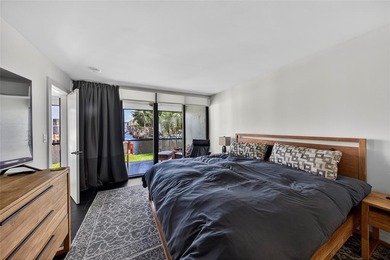 RESORT STYLE, BOUTIQUE CONDO FEATURES ASSIGNED BOAT DOCK FOR