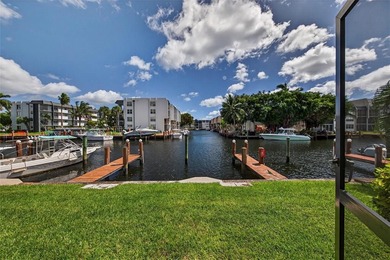 RESORT STYLE, BOUTIQUE CONDO FEATURES ASSIGNED BOAT DOCK FOR