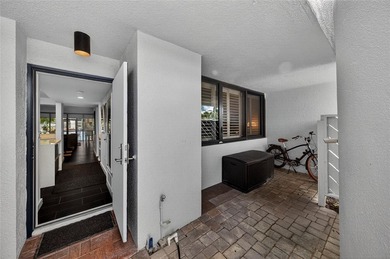 RESORT STYLE, BOUTIQUE CONDO FEATURES ASSIGNED BOAT DOCK FOR