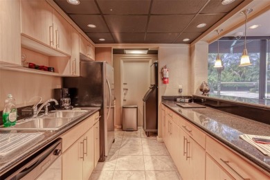 RESORT STYLE, BOUTIQUE CONDO FEATURES ASSIGNED BOAT DOCK FOR