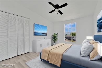 **SHORT SALE!** Light-filled corner home on the Caloosahatchee