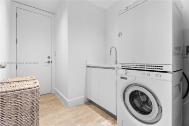 Live the ultimate South Beach lifestyle in this turnkey 3-bed, 3