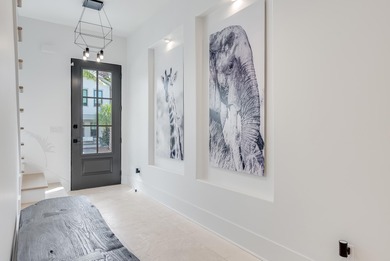 Poised within one of Inlet Beach's most refined enclaves, 63