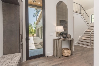 You'll find classic elegance in this transitional-style lake