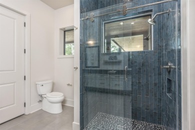 You'll find classic elegance in this transitional-style lake