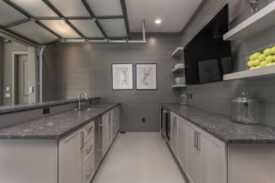 You'll find classic elegance in this transitional-style lake