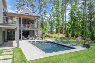 You'll find classic elegance in this transitional-style lake