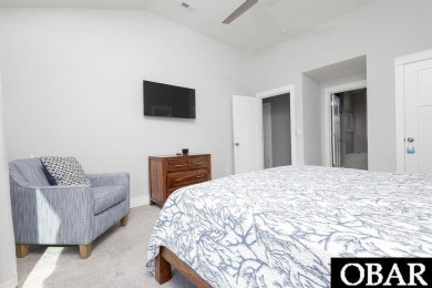 Nestled in the serene Corolla Bay community, 1024 Cruz Bay Lane