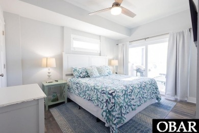 Nestled in the serene Corolla Bay community, 1024 Cruz Bay Lane