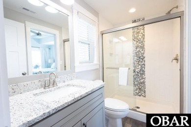 Nestled in the serene Corolla Bay community, 1024 Cruz Bay Lane