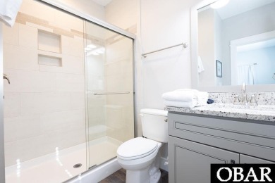 Nestled in the serene Corolla Bay community, 1024 Cruz Bay Lane