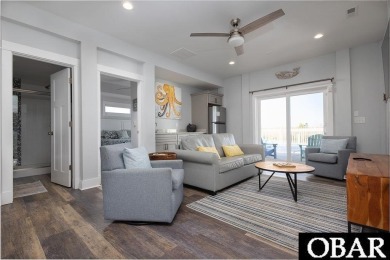 Nestled in the serene Corolla Bay community, 1024 Cruz Bay Lane