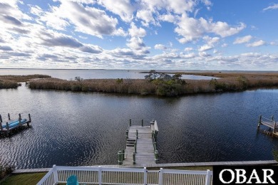 Nestled in the serene Corolla Bay community, 1024 Cruz Bay Lane