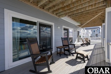 Nestled in the serene Corolla Bay community, 1024 Cruz Bay Lane