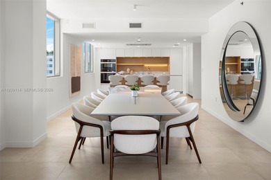 Step into this stunning corner unit at Onda, Bay Harbor's