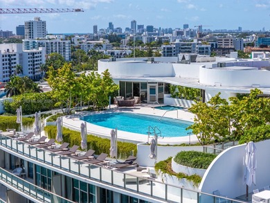 Step into this stunning corner unit at Onda, Bay Harbor's