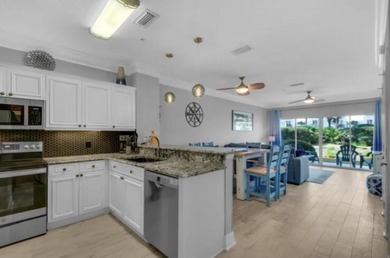 Steps from the Gulf, this beautifully remodeled ground-floor