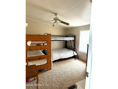 Water-lover's paradise! This lake home oasis is off the beaten