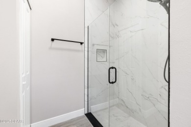 NO HOA! No CDD! This Stunning 3 Bedroom 2 Full Bathroom, 2 Car