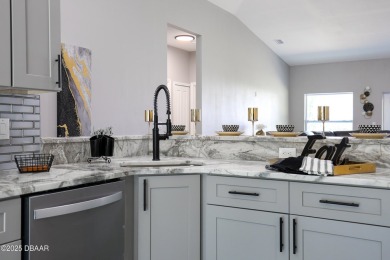 NO HOA! No CDD! This Stunning 3 Bedroom 2 Full Bathroom, 2 Car