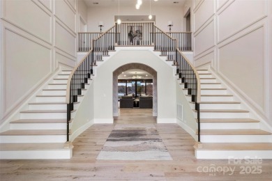 Experience the pinnacle of Lake Norman living from this