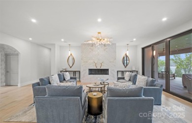 Experience the pinnacle of Lake Norman living from this