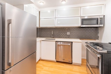 This well-positioned condo offers versatile living with