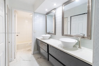 This well-positioned condo offers versatile living with