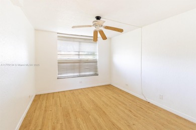 This well-positioned condo offers versatile living with