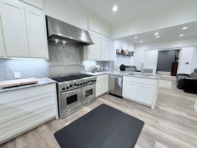 Welcome to refined luxury living nestled within the prestigious