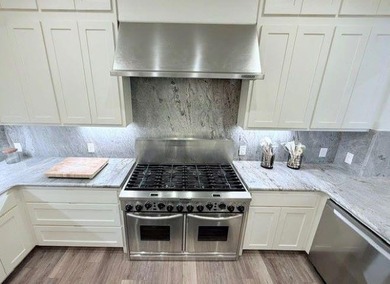 Welcome to refined luxury living nestled within the prestigious