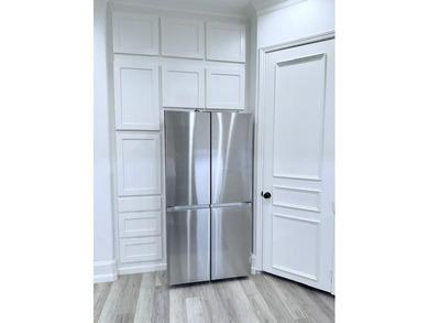 Welcome to refined luxury living nestled within the prestigious