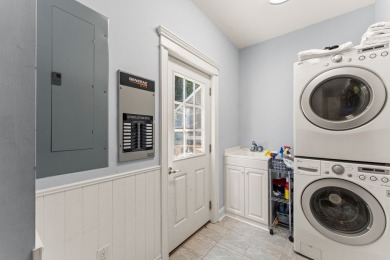 This high-top gem overlooking John's Creek affords privacy