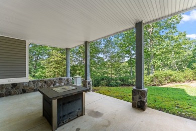 This high-top gem overlooking John's Creek affords privacy