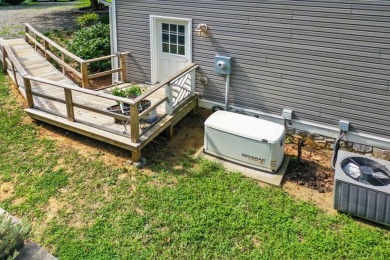 This high-top gem overlooking John's Creek affords privacy