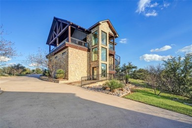 Come see this custom waterfront home that sits high on the hill