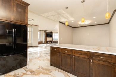 Experience luxury high-rise living in this stunning 4-bedroom