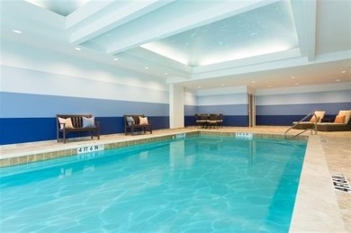 Experience luxury high-rise living in this stunning 4-bedroom