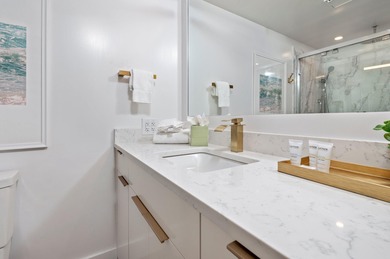 This charming bay facing studio condo, situated in the heart of