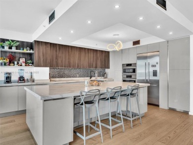 This exceptional residence showcases sweeping views of the ocean