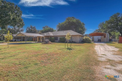 Nestled at the end of a quiet cul-de-sac, this 4-bedroom, 2-bath