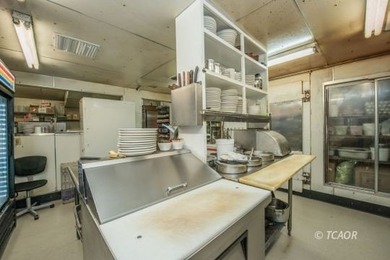 Total square footage of all buildings is 7,325, A very thriving