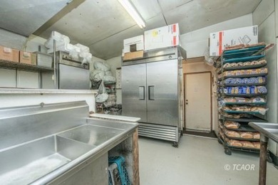 Total square footage of all buildings is 7,325, A very thriving