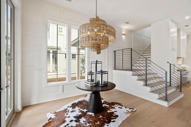 Upon entering this custom built residence in The Preserve at