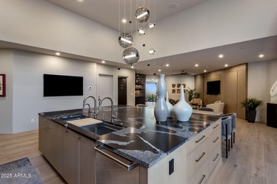 Situated in Desert Highlands coveted Hillside Villas, this