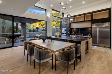 Situated in Desert Highlands coveted Hillside Villas, this