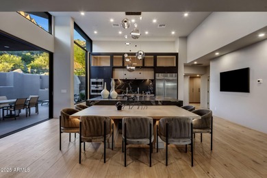 Situated in Desert Highlands coveted Hillside Villas, this