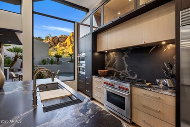 Situated in Desert Highlands coveted Hillside Villas, this