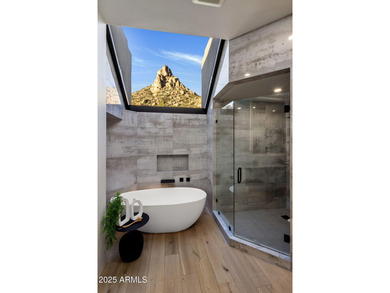 Situated in Desert Highlands coveted Hillside Villas, this