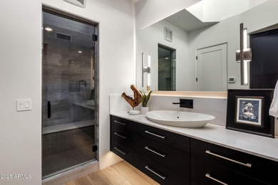 Situated in Desert Highlands coveted Hillside Villas, this